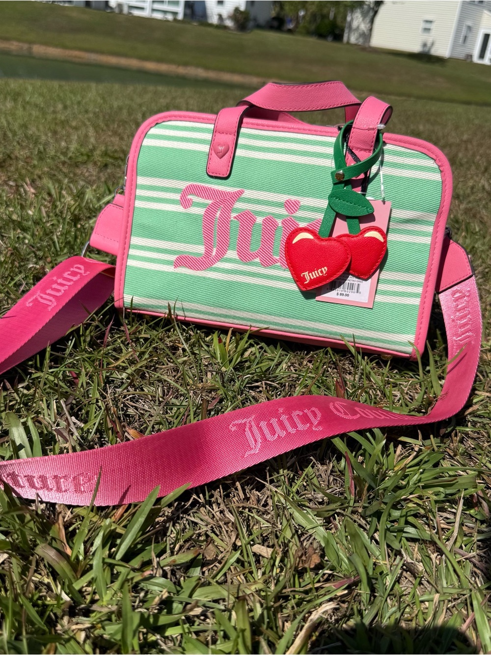 Juicy Couture Paradise Satchel in retro green and pink featuring a cherry charm